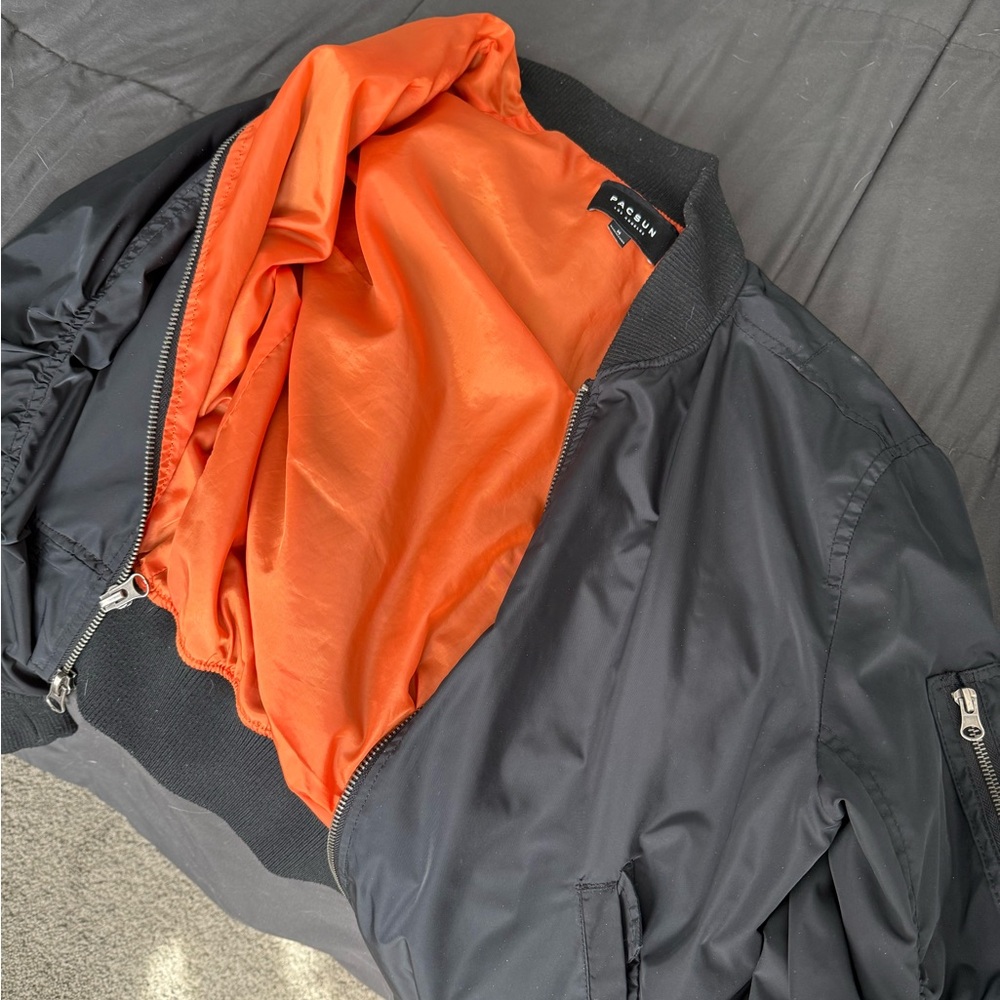 PacSun Black Bomber Jacket with Bright Orange Lining